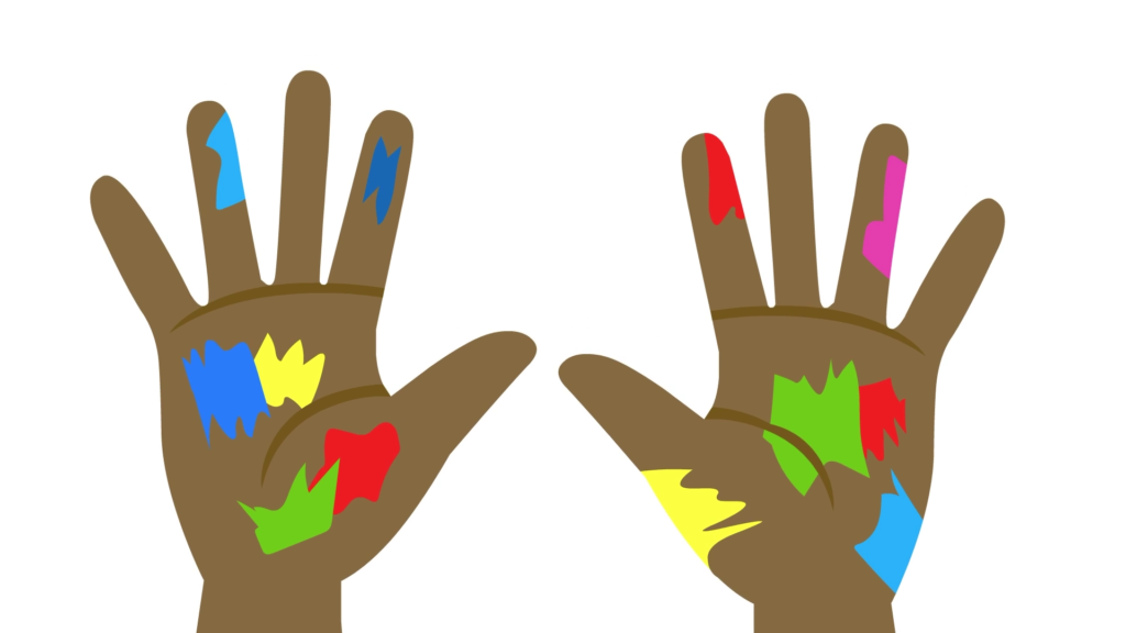 Two hands with different colors of paint on them.